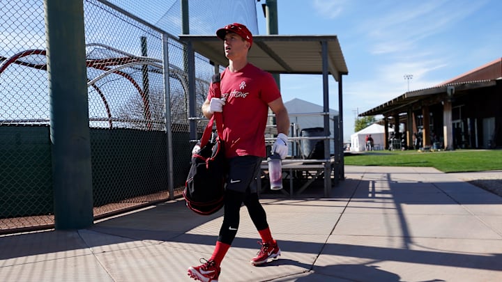 Cincinnati Reds shortstop Matt McLain (9) walks to take live batting practice during spring training workouts, Thursday, Feb. 15, 2024, at the team   s spring training facility in Goodyear, Ariz.