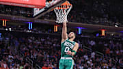 May 10, 2025; New York, New York, USA; Boston Celtics forward Jayson Tatum (0) drives to the basket in the fourth quarter against the New York Knicks during game three of the second round for the 2025 NBA Playoffs at Madison Square Garden. Mandatory Credit: Wendell Cruz-Imagn Images