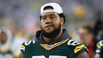 Green Bay Packers offensive guard Aaron Banks (65)