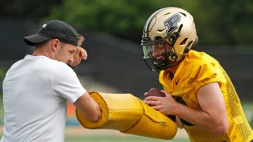 Purdue Boilermakers quarterback Carson Kitchel (20) runs a drill Wednesday, July 31, 2024, during Purdue football practice at Bimel Outdoor Practice Complex in West Lafayette, Ind.