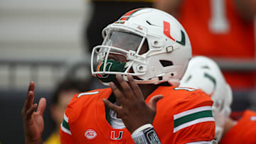 Nov 9, 2024; Atlanta, Georgia, USA; Miami Hurricanes quarterback Cam Ward (1) runs on the field before a game against the Georgia Tech Yellow Jackets at Bobby Dodd Stadium at Hyundai Field. Mandatory Credit: Brett Davis-Imagn Images