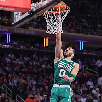 May 10, 2025; New York, New York, USA; Boston Celtics forward Jayson Tatum (0) drives to the basket in the fourth quarter against the New York Knicks during game three of the second round for the 2025 NBA Playoffs at Madison Square Garden. Mandatory Credit: Wendell Cruz-Imagn Images