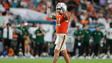 Sep 13, 2025; Miami Gardens, Florida, USA; Miami Hurricanes quarterback Carson Beck (11) reacts against the South Florida Bulls during the third quarter at Hard Rock Stadium. Mandatory Credit: Sam Navarro-Imagn Images