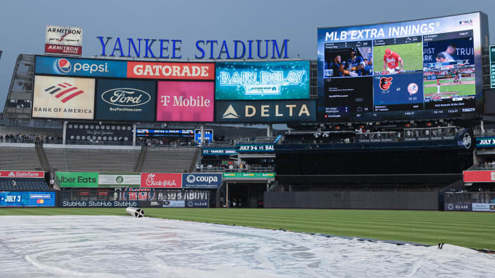 May 24, 2023; Bronx, New York, USA; The scoreboard at Yankee Stadium during a rain delay before a game between the New York Yankees and the Baltimore Orioles at Yankee Stadium.