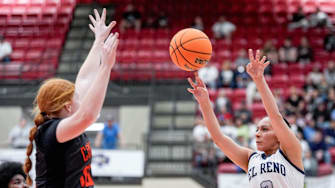 El Reno shoots a 3-pointer during a 5A OSSAA girls basketball semifinal game between Coweta and El Reno, at Yukon High School in Yukon Okla., on Thursday, March 13, 2025.