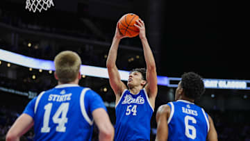 Dec 17, 2024; Kansas City, Missouri, USA; Drake Bulldogs forward Daniel Abreu (54) goes up for a dunk during the second half against the Kansas State Wildcats at T-Mobile Center. Mandatory Credit: Jay Biggerstaff-Imagn Images
