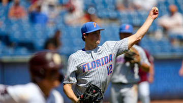 Florida pitcher Hunter Barco (12) fields a bunt and throws to first to record an out against Mississippi State during the SEC Tournament Tuesday, May 26, 2021, in the Hoover Met in Hoover, Alabama. [Staff Photo/Gary Cosby Jr.]

Sec Tournament Florida Vs Mississippi State
