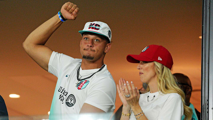 Aug 17, 2024; Kansas City, MO, USA; Patrick Mahomes and Brittany Mahomes cheer during the game between the Kansas City Current and Atletico De Madrid during The Women’s Cup at CPKC Stadium. Mandatory Credit: Jay Biggerstaff-Imagn Images