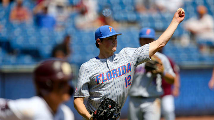 Florida pitcher Hunter Barco (12) fields a bunt and throws to first to record an out against Mississippi State during the SEC Tournament Tuesday, May 26, 2021, in the Hoover Met in Hoover, Alabama. [Staff Photo/Gary Cosby Jr.]

Sec Tournament Florida Vs Mississippi State