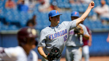 Florida pitcher Hunter Barco (12) fields a bunt and throws to first to record an out against Mississippi State during the SEC Tournament Tuesday, May 26, 2021, in the Hoover Met in Hoover, Alabama. [Staff Photo/Gary Cosby Jr.]

Sec Tournament Florida Vs Mississippi State