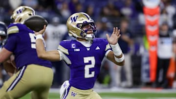 Sep 6, 2025; Seattle, Washington, USA; Washington Huskies quarterback Demond Williams Jr. (2) poses against the UC Davis Aggies during the third quarter at Husky Stadium. Mandatory Credit: Joe Nicholson-Imagn Images