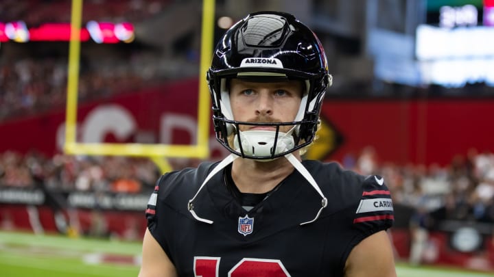 Oct 8, 2023; Glendale, Arizona, USA; Arizona Cardinals punter Blake Gillikin (12) against the Cincinnati Bengals at State Farm Stadium. Mandatory Credit: Mark J. Rebilas-USA TODAY Sports