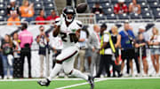 Sep 15, 2025; Houston, Texas, USA;  Houston Texans running back Nick Chubb (21) warms up before the game against the Tampa Bay Buccaneers at NRG Stadium. 