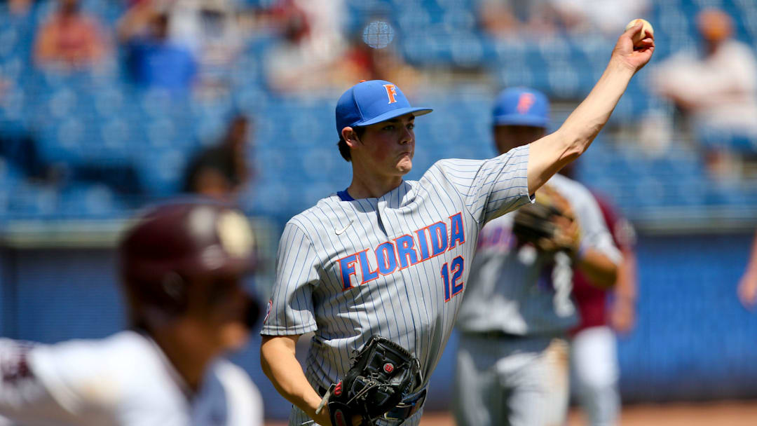 Florida pitcher Hunter Barco (12) fields a bunt and throws to first to record an out against Mississippi State during the SEC Tournament Tuesday, May 26, 2021, in the Hoover Met in Hoover, Alabama. [Staff Photo/Gary Cosby Jr.]

Sec Tournament Florida Vs Mississippi State