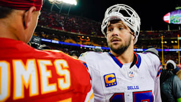 Dec 10, 2023; Kansas City, Missouri, USA; Buffalo Bills quarterback Josh Allen (17) talks with Kansas City Chiefs quarterback Patrick Mahomes (15) after a game  at GEHA Field at Arrowhead Stadium. Mandatory Credit: Jay Biggerstaff-Imagn Images