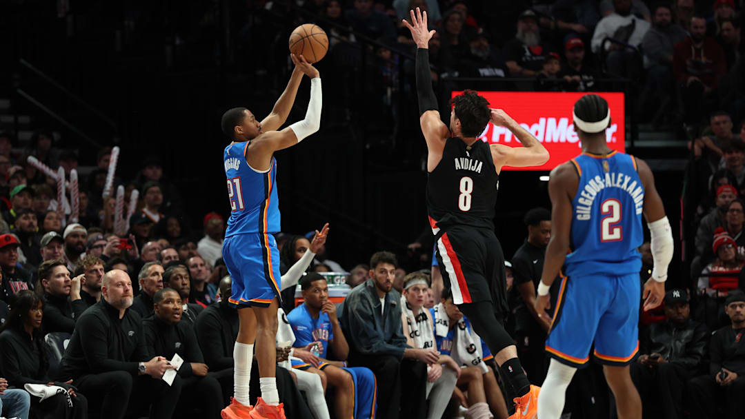 Nov 5, 2025; Portland, Oregon, USA; Oklahoma City Thunder guard Aaron Wiggins (21) shoots the ball over Portland Trail Blazers forward Deni Avdija (8) during the second half at Moda Center. Mandatory Credit: Jaime Valdez-Imagn Images Nov 5, 2025; Portland, Oregon, USA; Oklahoma City Thunder guard Aaron Wiggins (21) shoots the ball over Portland Trail Blazers forward Deni Avdija (8) during the second half at Moda Center. Mandatory Credit: Jaime Valdez-Imagn Images