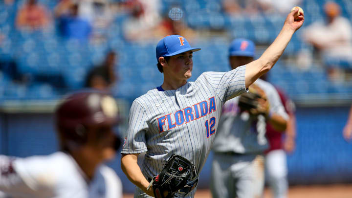 Florida pitcher Hunter Barco (12) fields a bunt and throws to first to record an out against Mississippi State during the SEC Tournament Tuesday, May 26, 2021, in the Hoover Met in Hoover, Alabama. [Staff Photo/Gary Cosby Jr.]

Sec Tournament Florida Vs Mississippi State