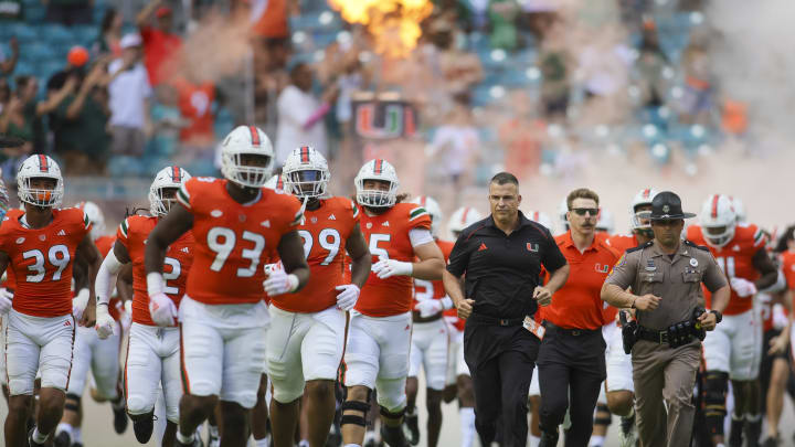 Oct 28, 2023; Miami Gardens, Florida, USA; Miami Hurricanes head coach Mario Cristobal takes on the field prior to a game against the Virginia Cavaliers at Hard Rock Stadium. Mandatory Credit: Sam Navarro-USA TODAY Sports