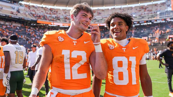 Tennessee quarterback Jake Merklinger (12) and Tennessee wide receiver Amari Jefferson (81) smile after a NCAA football game between Tennessee and UAB at Neyland Stadium in Knoxville, Tenn., September 20, 2025.