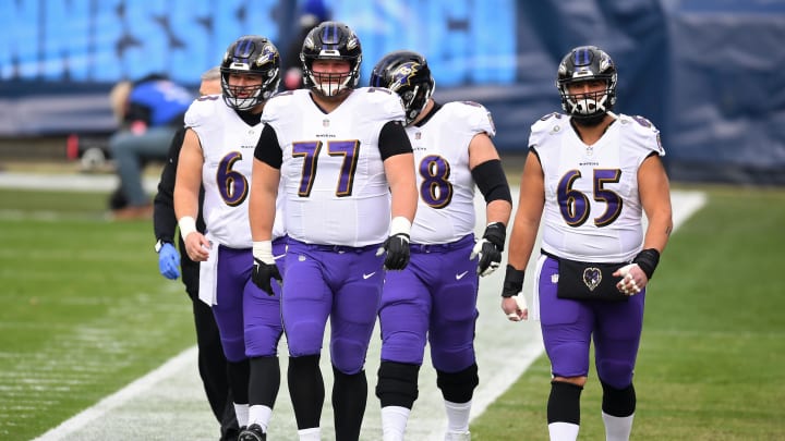 Jan 10, 2021; Nashville, Tennessee, USA; Baltimore Ravens center Patrick Mekari (65) and guard Bradley Bozeman (77) walk with the Ravens offensive line before a AFC Wild Card playoff game against the Tennessee Titans at Nissan Stadium. Mandatory Credit: Christopher Hanewinckel-USA TODAY Sports