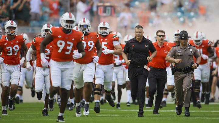 Oct 28, 2023; Miami Gardens, Florida, USA; Miami Hurricanes head coach Mario Cristobal takes on the field prior to a game against the Virginia Cavaliers at Hard Rock Stadium. Mandatory Credit: Sam Navarro-USA TODAY Sports