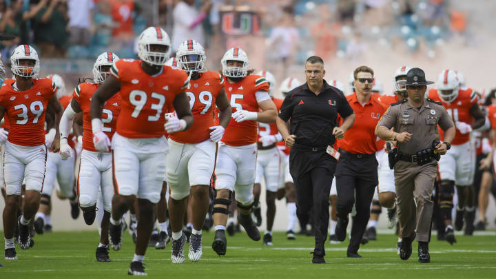 Oct 28, 2023; Miami Gardens, Florida, USA; Miami Hurricanes head coach Mario Cristobal takes on the field prior to a game against the Virginia Cavaliers at Hard Rock Stadium. Mandatory Credit: Sam Navarro-USA TODAY Sports