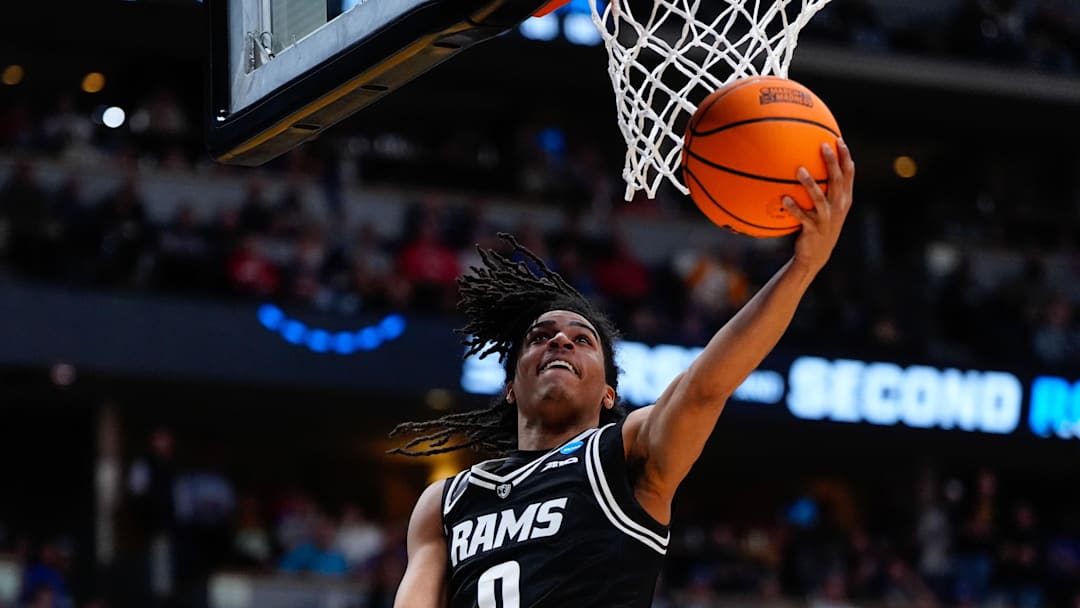 Mar 20, 2025; Denver, CO, USA; VCU Rams guard Brandon Jennings (0) shoots the ball against the Brigham Young Cougars during the second half in the first round of the NCAA Tournament at Ball Arena. Mandatory Credit: Ron Chenoy-Imagn Images
