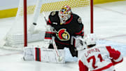 Mar 10, 2025; Ottawa, Ontario, CAN; Detroit Red Wings center Dylan Larkin (71) scores against Ottawa Senators goalie Linus Ullmark (35) in the third period at the Canadian Tire Centre. Mandatory Credit: Marc DesRosiers-Imagn Images