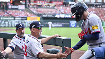Jul 13, 2025; St. Louis, Missouri, USA;  Atlanta Braves shortstop Nick Allen (2) is congratulated by Atlanta Braves manager Brian Snitker (43) after scoring against the St. Louis Cardinals during the third inning at Busch Stadium. Mandatory Credit: Jeff Curry-Imagn Images