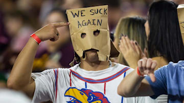 Oct 5, 2024; Tempe, Arizona, USA; Kansas Jayhawks fans in the crowd wear paper bags over their heads against the Arizona State Sun Devils at Mountain America Stadium.