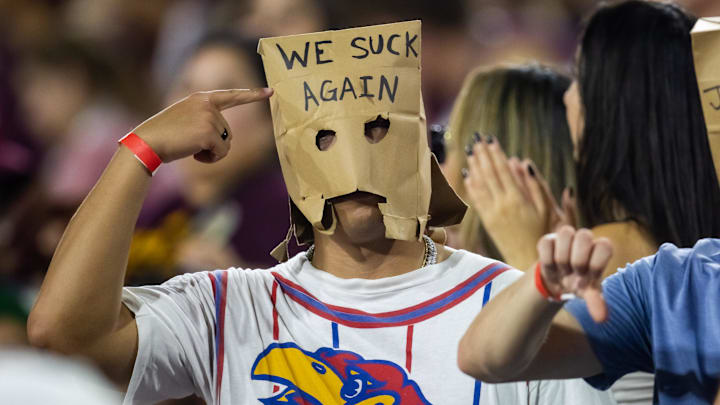Oct 5, 2024; Tempe, Arizona, USA; Kansas Jayhawks fans in the crowd wear paper bags over their heads against the Arizona State Sun Devils at Mountain America Stadium.
