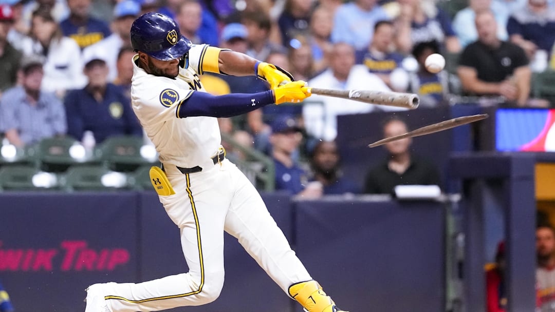 Sep 4, 2024; Milwaukee, Wisconsin, USA;  Milwaukee Brewers designated hitter Jackson Chourio (11) breaks his bat while hitting a double during the fourth inning against the St. Louis Cardinals at American Family Field. Mandatory Credit: Jeff Hanisch-Imagn Images