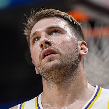 Nov 8, 2025; Atlanta, Georgia, USA; Los Angeles Lakers guard Luka Doncic (77) reacts after a call during the game against the Atlanta Hawks during the first half at State Farm Arena. Mandatory Credit: Dale Zanine-Imagn Images