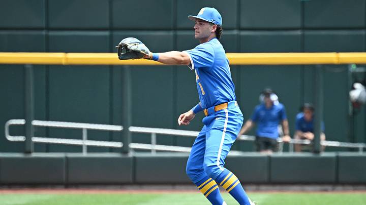Jun 14, 2025; Omaha, Neb, USA;  UCLA Bruins shortstop Roch Cholowsky (1) signals after a strike call against the Murray State Racers during the first inning at Charles Schwab Field. Mandatory Credit: Steven Branscombe-Imagn Images