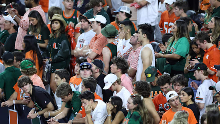 Apr 1, 2023; Houston, TX, USA; Miami Hurricanes fans react after the game against Miami (Fl) Hurricanes in the semifinals of the Final Four of the 2023 NCAA at NRG Stadium. Mandatory Credit: Troy Taormina-Imagn Images