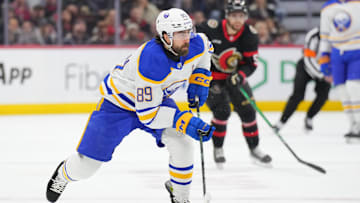 Alex Tuch (89) skating up the ice in a game against the Ottawa Senators