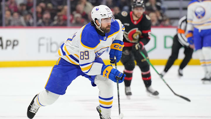 Alex Tuch (89) skating up the ice in a game against the Ottawa Senators