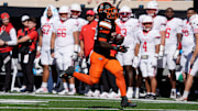 Oklahoma State Cowboys running back Rodney Fields Jr. (20) runs to the end zone to score a touchdown after a reception during a college football game between the Oklahoma State Cowboys (OSU) and the Houston Cougars at Boone Pickens Stadium in Stillwater, Okla., Saturday, Oct. 11, 2025.