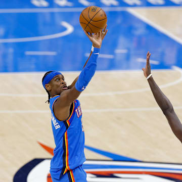 Gilgeous-Alexander shoots the ball over Siakam during the 2025 NBA Finals at Paycom Center. 