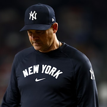 Aug 5, 2025; Arlington, Texas, USA;  New York Yankees manager Aaron Boone (17) reacts during the eighth inning against the Texas Rangers at Globe Life Field. Mandatory Credit: Kevin Jairaj-Imagn Images