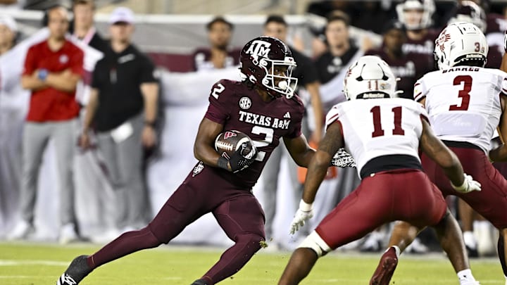 Nov 16, 2024; College Station, Texas, USA; Texas A&M Aggies wide receiver Terry Bussey (2) runs the ball during the fourth quarter against the New Mexico State Aggies at Kyle Field. Mandatory Credit: Maria Lysaker-Imagn Images Nov 16, 2024; College Station, Texas, USA; Texas A&M Aggies wide receiver Terry Bussey (2) runs the ball during the fourth quarter against the New Mexico State Aggies at Kyle Field. Mandatory Credit: Maria Lysaker-Imagn Images