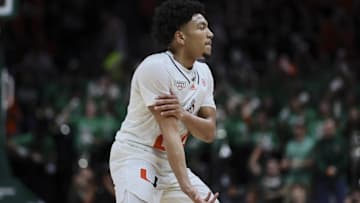 Jan 17, 2024; Coral Gables, Florida, USA; Miami Hurricanes guard Nijel Pack (24) reacts after scoring against the Florida State Seminoles during the second half at Watsco Center. Mandatory Credit: Sam Navarro-Imagn Images