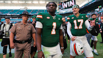 Nov 23, 2024; Miami Gardens, Florida, USA; Miami Hurricanes quarterback Cam Ward (1) looks on from the field after the game against the Wake Forest Demon Deacons at Hard Rock Stadium. Mandatory Credit: Sam Navarro-Imagn Images
