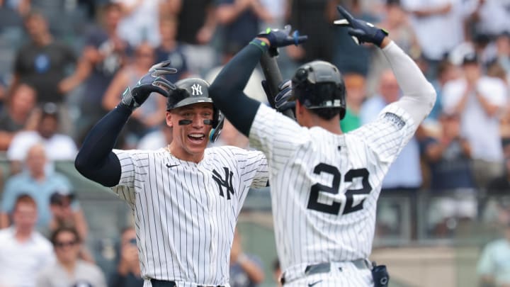 Aug 4, 2024; Bronx, New York, USA;  New York Yankees right fielder Juan Soto (22) celebrates his solo home run during the seventh inning against the Toronto Blue Jays with left fielder Aaron Judge (99) at Yankee Stadium. Mandatory Credit: Vincent Carchietta-USA TODAY Sports