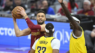 Apr 12, 2024; Cleveland, Ohio, USA; Cleveland Cavaliers guard Max Strus (1) looks to the basket beside Indiana Pacers center Myles Turner (33) in the first quarter at Rocket Mortgage FieldHouse. Mandatory Credit: David Richard-Imagn Images