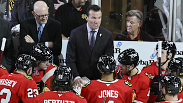 Oct 19, 2024; Chicago, Illinois, USA;  Chicago Blackhawks head coach Luke Richardson talks with the team during the third period against the Buffalo Sabres at the United Center. Mandatory Credit: Matt Marton-Imagn Images