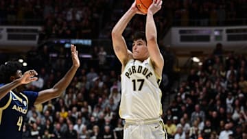 Purdue Boilermakers guard Omer Mayer (17) passes the ball
