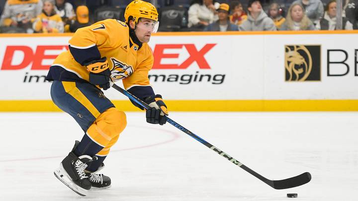 Apr 6, 2025; Nashville, Tennessee, USA;  Nashville Predators defenseman Marc Del Gaizo (7) skates with the puck against the Montreal Canadiens during the first period at Bridgestone Arena.