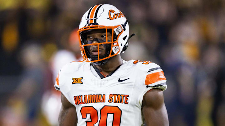 Sep 9, 2023; Tempe, Arizona, USA; Oklahoma State Cowboys linebacker Collin Oliver (30) against the Arizona State Sun Devils at Mountain America Stadium. Mandatory Credit: Mark J. Rebilas-Imagn Images