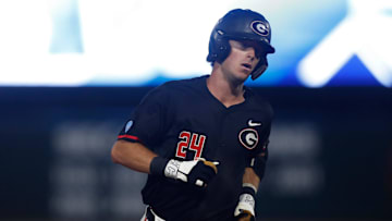 Georgia's Charlie Condon (24) rounds the bases after hitting a home run during Game 3 of the Super NCAA Regional against NC State at Foley Field on Monday, June 10, 2024 in Athens, Ga. NC State won 8-5.